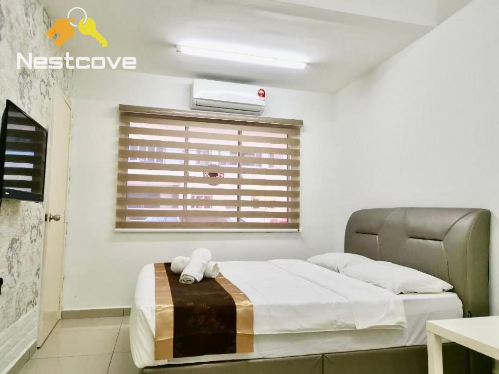 Voodi või voodid majutusasutuse The Hideaway Malacca Stay By Nestcove toas