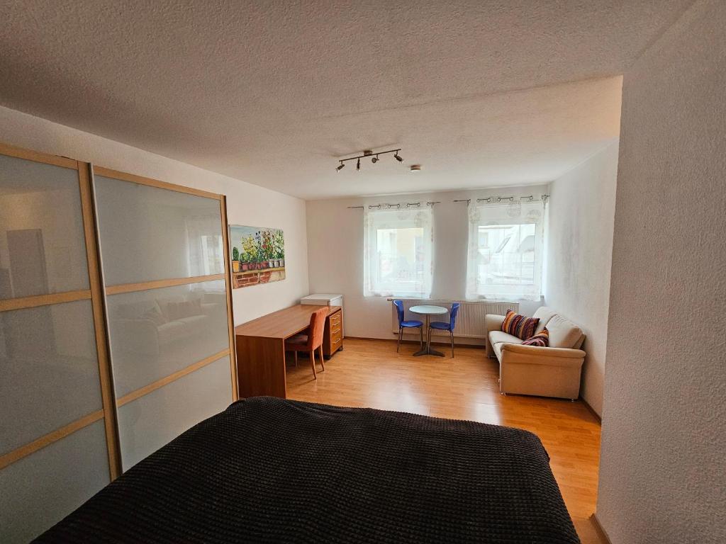 Ruang duduk di Gemütliches Apartment nahe dem Stadtzentrum