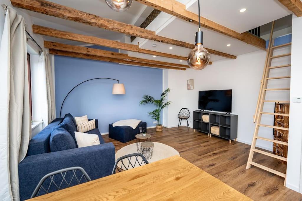 TV/trung tâm giải trí tại Moderne Maisonette Wohnung im Flüsseviertel