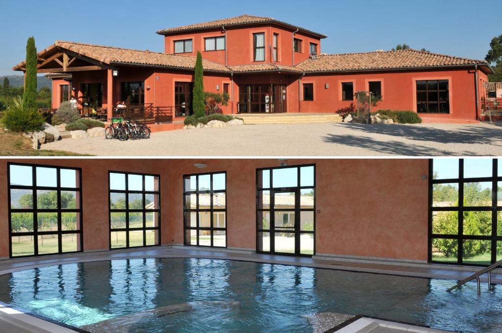 una grande casa con una piscina di fronte di Domaine d'Agrippa Valence a Châteauneuf-sur-Isère