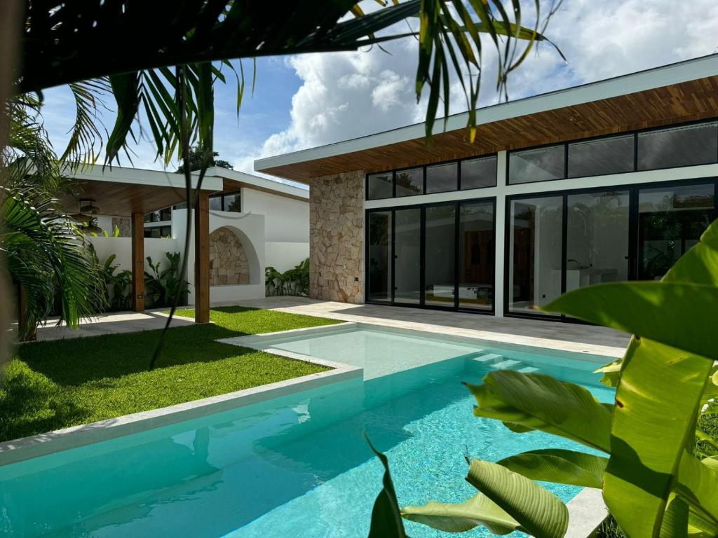 an image of a swimming pool in front of a house at Tropical Pool Villa near Fishermans Village in Bophut 