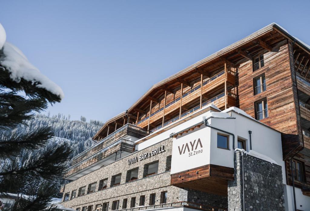 a building with a sign on the side of it at VAYA St Zeno Serfaus in Serfaus