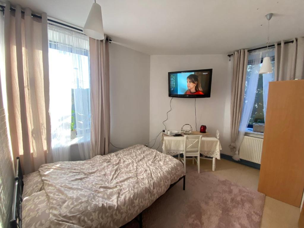 Ліжко або ліжка в номері Apartamenty Arkuszowa 58