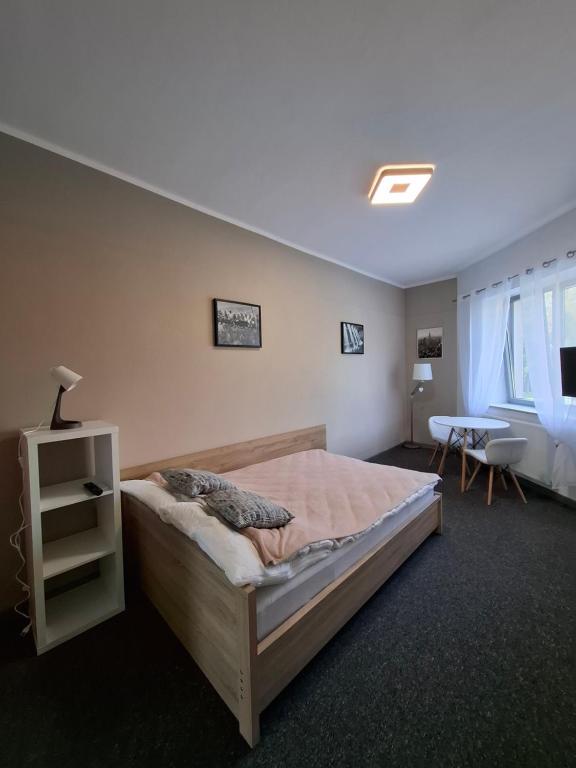 Postelja oz. postelje v sobi nastanitve Apartament Maja