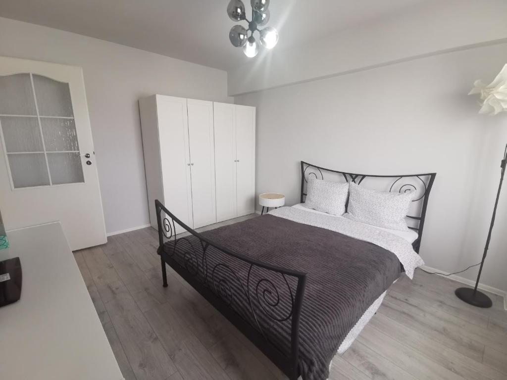 Cama ou camas em um quarto em Apartament Carla