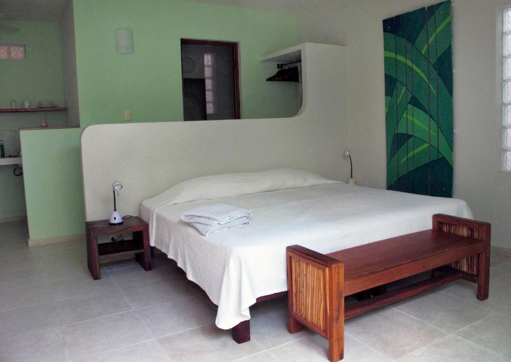 Tempat tidur dalam kamar di Elements of the Island