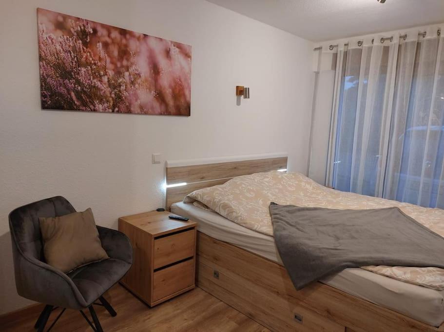 A bed or beds in a room at Ferienwohnung Walsrode