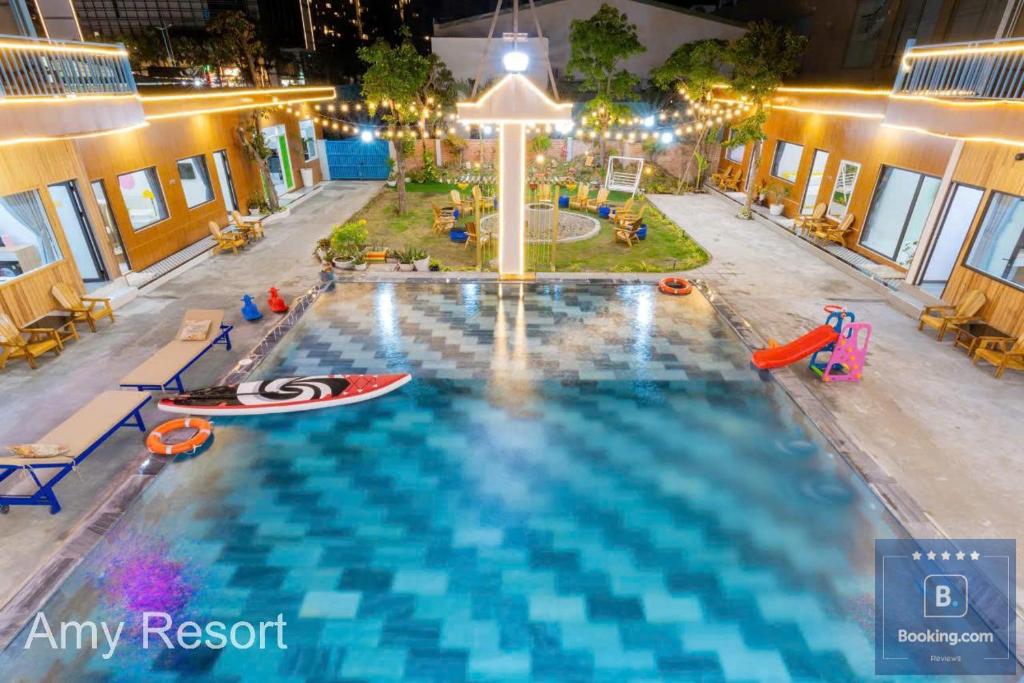 Bazen u ili blizu objekta Amy Resort Pool Party - Đi Bộ Ra Biển - Thích Hợp Tổ Chức Tiệc Team Building