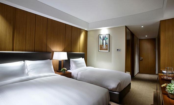 Cama ou camas em um quarto em LOTTE City Hotel Guro