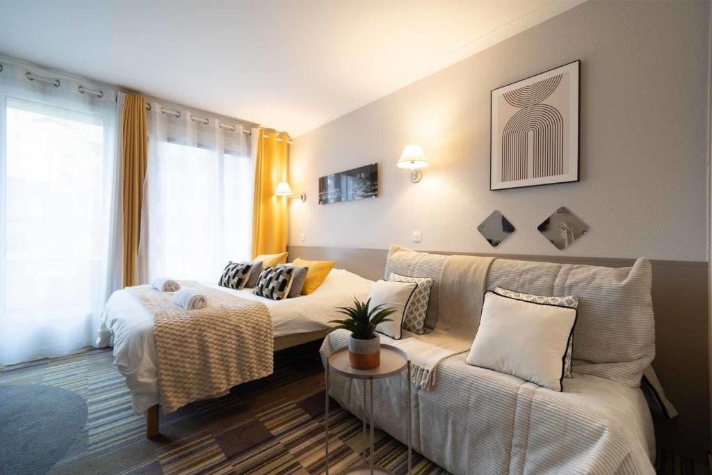 Χώρος καθιστικού στο Paris Porte de Versailles Cosy Lodge Appart hôtel parking wifi 4 pers