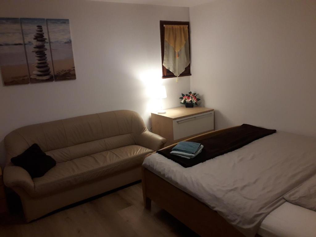 Uma área de estar em APARTMENT Top 11 ZENTRUM mit 2 Schlafzimmer BESTROOMS eU