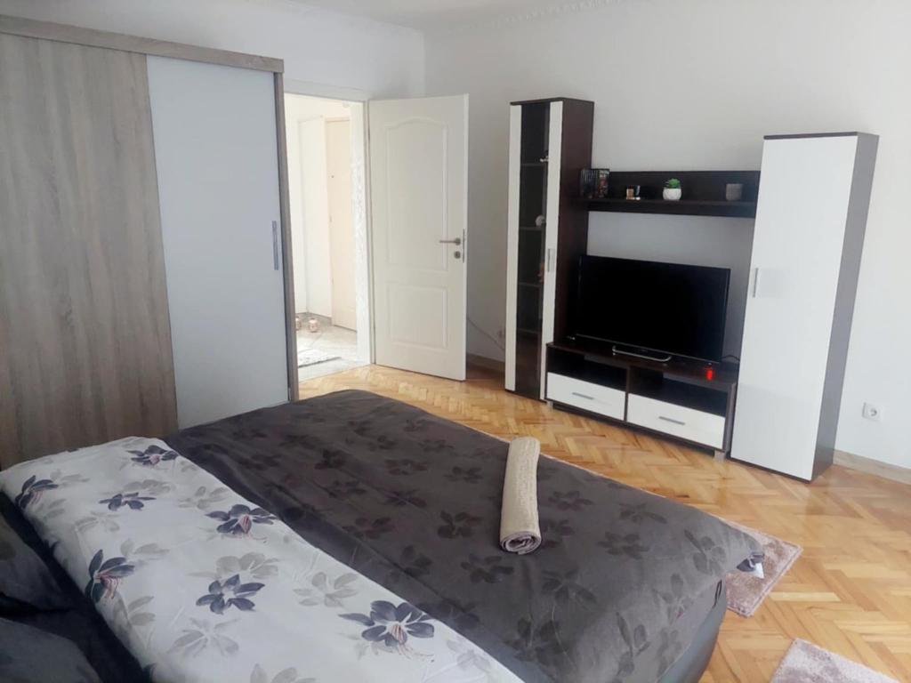 Vuode tai vuoteita majoituspaikassa Apartman Time