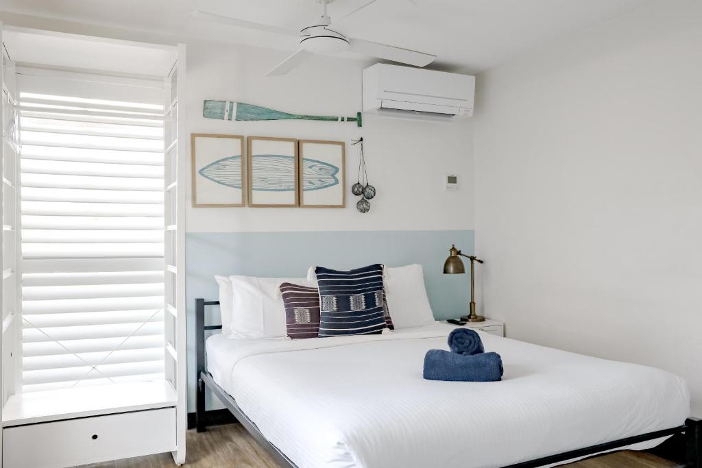 Cama ou camas em um quarto em The Surf House