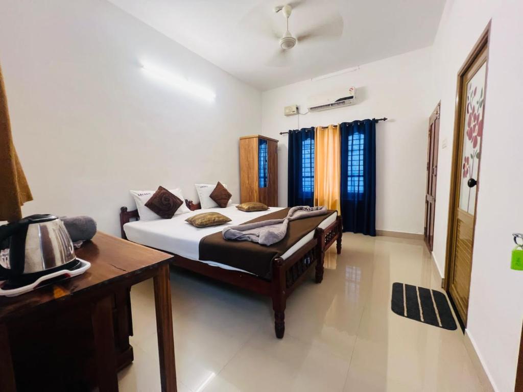 Легло или легла в стая в New coco inn varkala cliff