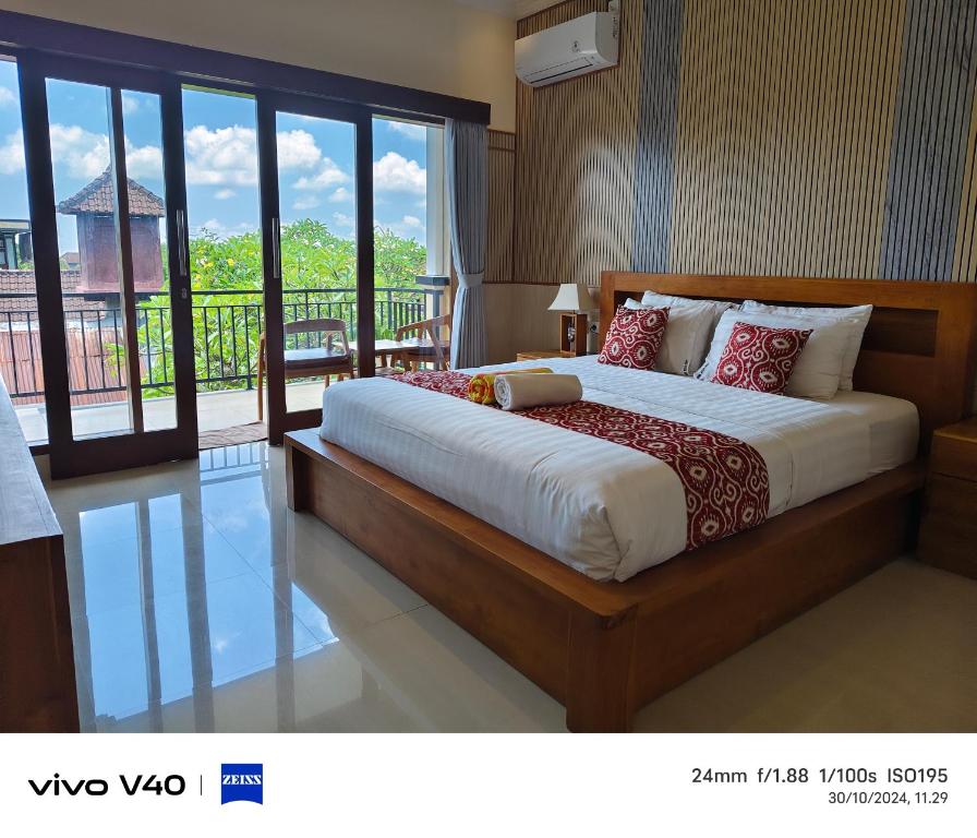 Una cama o camas en una habitación de DANU HOUSE UBUD