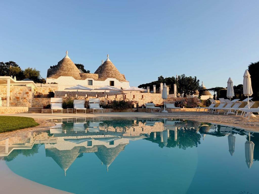 a view of a pool at a resort at Borgofreddo Luxury Suite in Monopoli