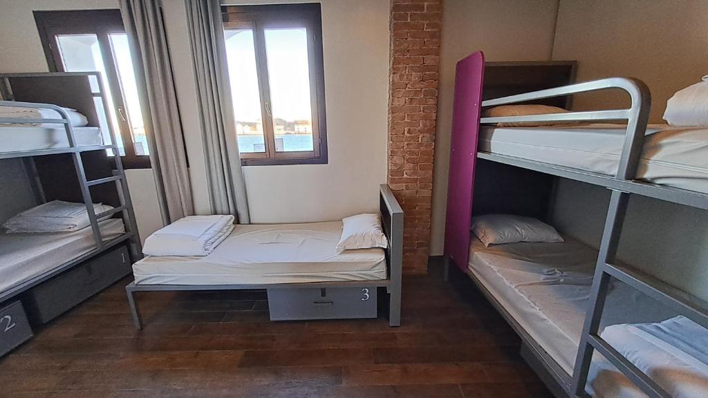 Tempat tidur dalam kamar di Generator Venice