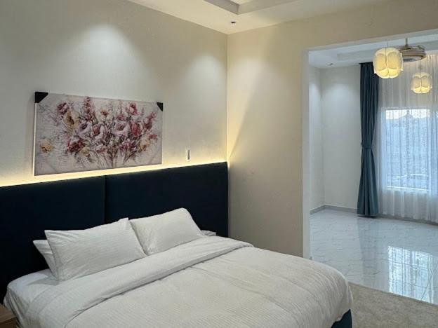 Ένα ή περισσότερα κρεβάτια σε δωμάτιο στο Luxury Wadi front Apartment