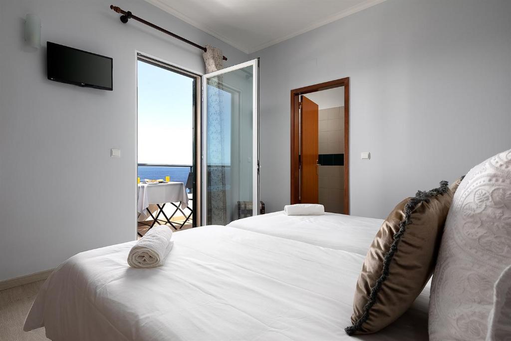 Cama ou camas em um quarto em Pérola Views Inn by Madeira Sun Travel