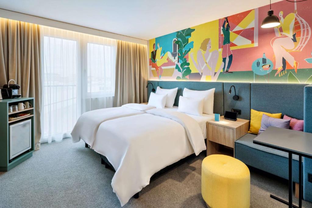 Cama ou camas em um quarto em Spark by Hilton Vienna Messe Prater