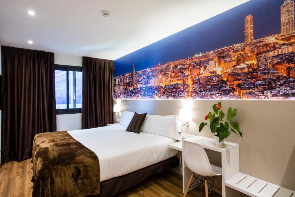 A bed or beds in a room at Hotel BESTPRICE Gracia