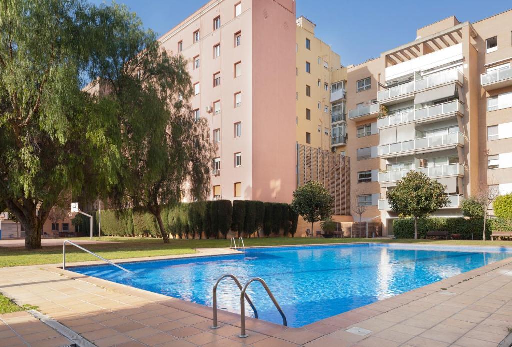 Poolen vid eller i närheten av Enjoybcn Marina Apartment