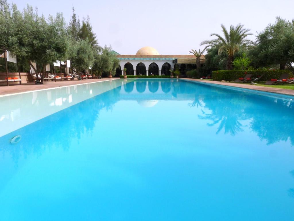 The swimming pool at or close to Manzil La Tortue