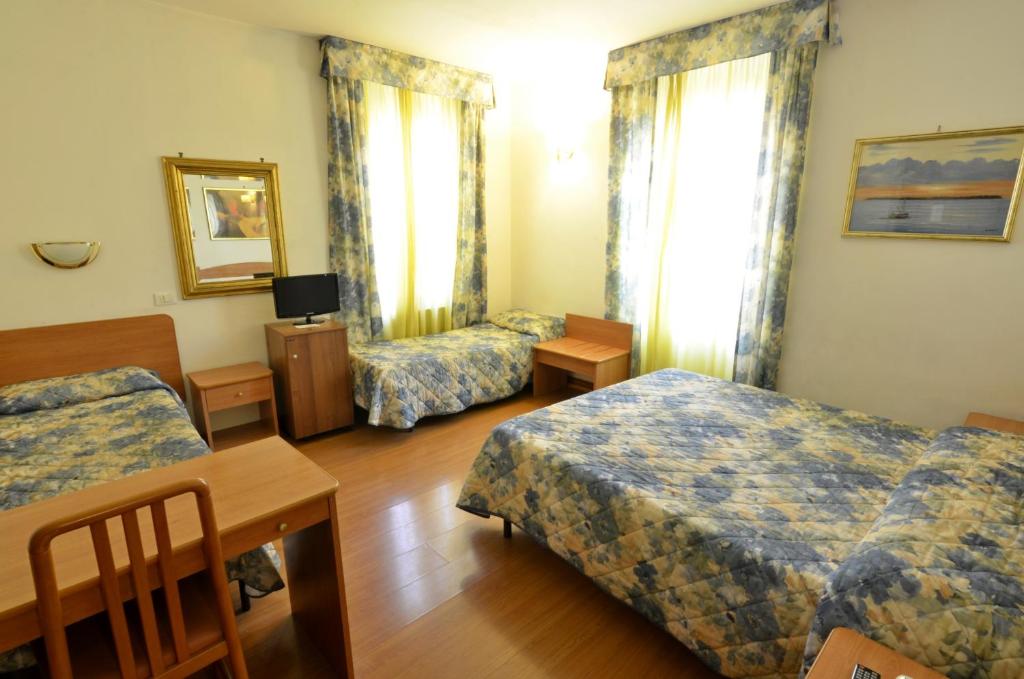 Krevet ili kreveti u jedinici u okviru objekta Hotel Tirreno