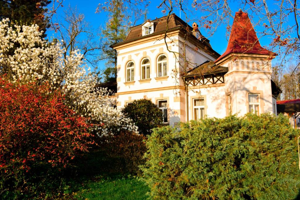 A garden outside Hotel Zámeček na Čeladné