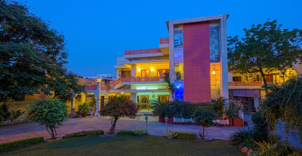 a building with a lit up facade at night at Rawla Rawatsar in Jaipur