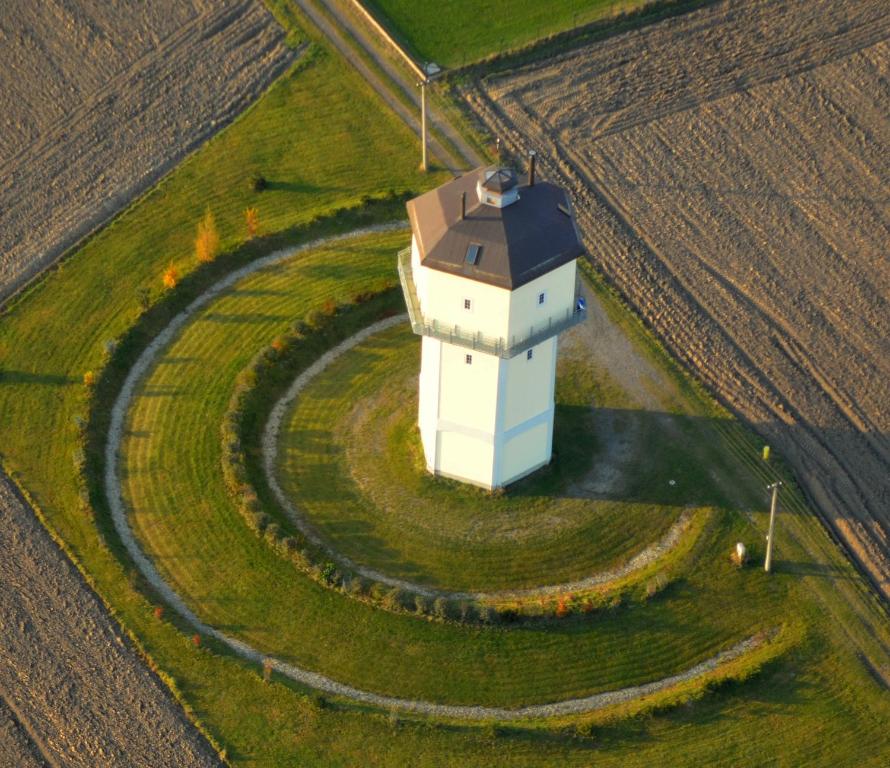 an aerial view of a building in a field at Art Tower in Vratimov