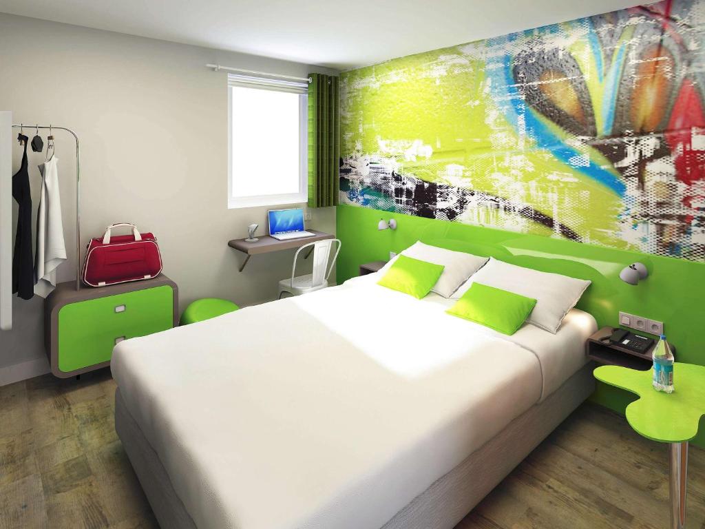 Katil atau katil-katil dalam bilik di Ibis Styles Lyon Villeurbanne Parc de la Tête d'Or