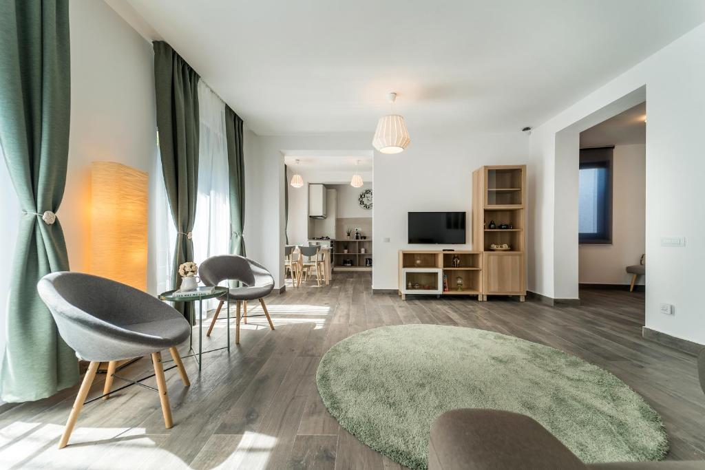 TV i/ili multimedijalni sistem u objektu Vila Cotroceni Boutique Apartments