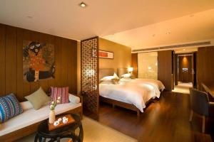 Krevet ili kreveti u jedinici u okviru objekta SSAW Boutique Hotel Hangzhou Wildwind