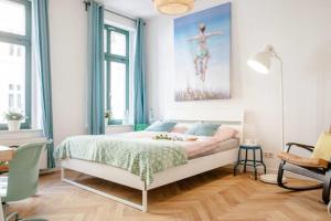 Tempat tidur dalam kamar di Enjoy Leipzig