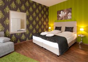 Katil atau katil-katil dalam bilik di Arthotel ANA Residence Bremen