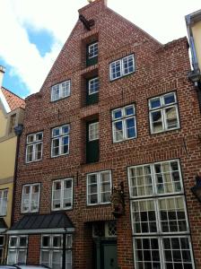 リューネブルクにあるAltstadt Apartmentsの赤レンガ造り