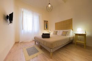 Voodi või voodid majutusasutuse B&B In Acquaviva toas