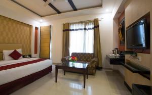 En eller flere senger på et rom på Hotel Krishna - By RCG Hotels, Paharganj, New Delhi