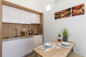 Una cocina o kitchenette en Villa Astoria