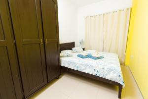 Tempat tidur dalam kamar di Cumbuco Kite Village Deluxe