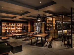 a dining room with a table and chairs at Kyoto Granbell Hotel in Kyoto