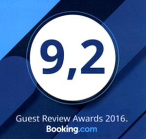 a sign that says guest review awards with the number at Chez Catherine in Roquebrune-sur-Argens