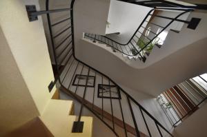 an overhead view of a staircase in a house at Gasthaus Skiklub in Andermatt