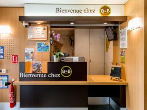 Chứng chỉ, giải thưởng, bảng hiệu hoặc các tài liệu khác trưng bày tại B&B HOTEL Bordeaux Mérignac Hôtel de Ville