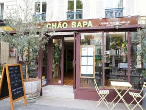 a chico saapa restaurant with a sign in front of it at Camellia Guest House in Sa Pa