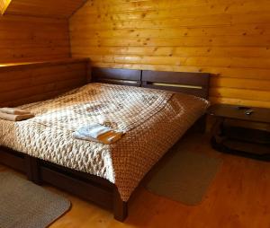 Кровать или кровати в номере Guest House U Stasuka