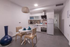 A kitchen or kitchenette at Silvi Villas by TAM Resorts