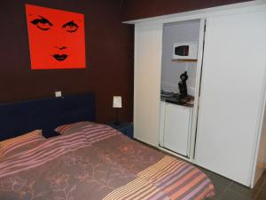 A bed or beds in a room at B&B Le 'Ti 'Bou de Refuge