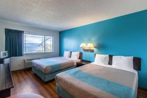 Uma cama ou camas num quarto em Motel 6-Astoria, OR